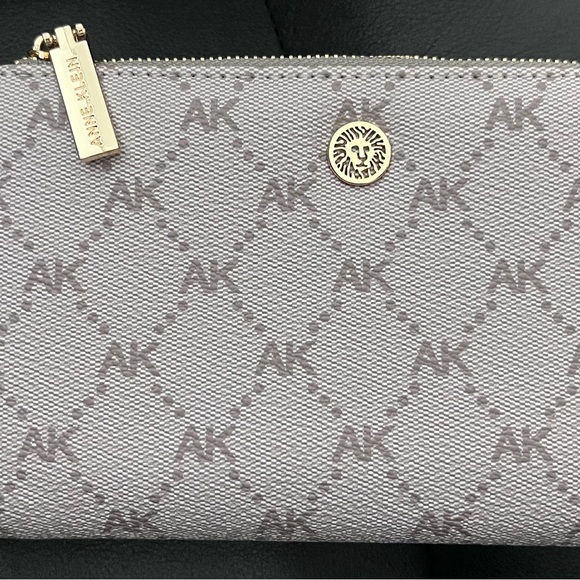 Anne Klein Handbags - Anne Klein Gray Cosmetic Bag with Gold Accents